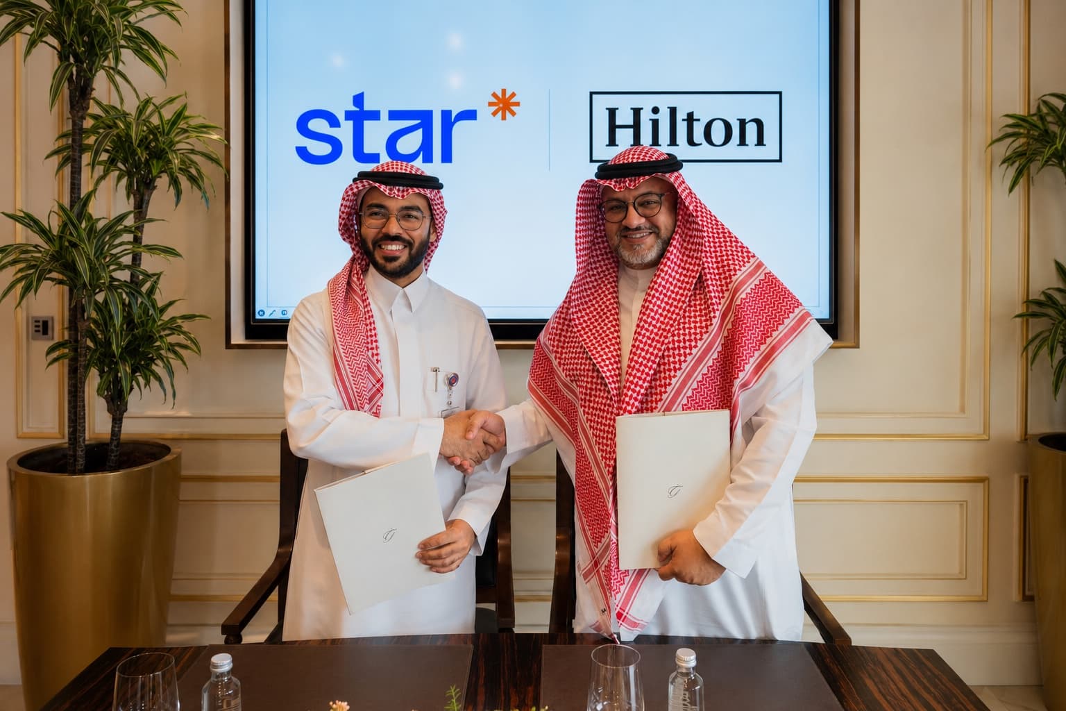 Star and Hilton partnership signing